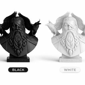 May include: A black and a white bust of a bearded figure with an eye patch, flanked by two ravens with outstretched wings. The busts are on a pedestal, with the word "BLACK" and "WHITE" below each.