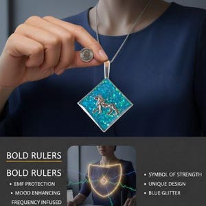 May include: A silver pendant necklace with a square, turquoise-colored glitter-filled pendant. A silver horse figure is centered on the pendant. The image also includes the text "BOLD RULERS" and "UNLEASH YOUR POWER".
