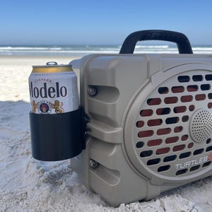 May include: A trio of ceramic mugs with a speckled, matte finish in cream, light grey, and dark grey. Each mug features a simple, minimalist design, ideal for tea or coffee.