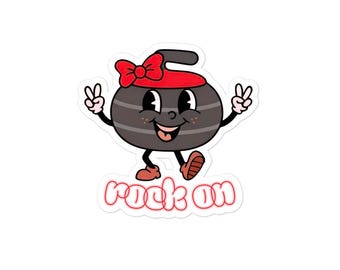 May include: A sticker featuring a cartoon curling stone with a red bow and a red hat. The stone has a smiling face and is giving the peace sign with both hands. The text "rock on" is below the stone.