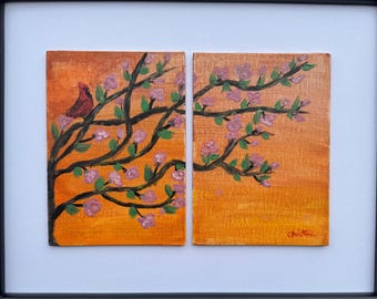 Quando il cielo era arancione – Originale tela artistica raffigurante un uccello cardinale al tramonto