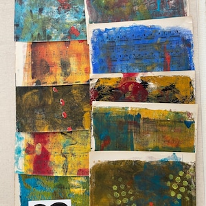 May include: A collection of abstract art pieces on aged paper. Each piece features a blend of colors like blue, yellow, red, and green, with visible musical notation. The artwork is layered with textured paint and a white infinity symbol.