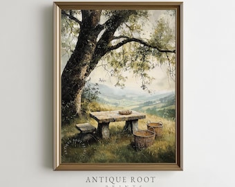 May include: A framed print of a pastoral scene featuring a stone picnic table and bench under a large tree. Two wicker baskets sit nearby in a grassy field, with rolling hills in the background. The text "ANTIQUE ROOT PRINTS" is at the bottom.