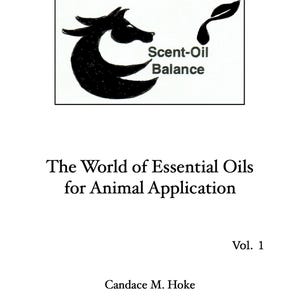 May include: A book cover with the title "The World of Essential Oils for Animal Application, Vol. 1." The cover features a black logo with a stylized animal head and the words "Scent-Oil Balance."