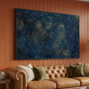 May include: A rectangular wall art piece featuring a dark blue celestial map with intricate gold lines, circular grid patterns, and scattered star constellations. The design displays a detailed astronomical chart with fine golden markings.