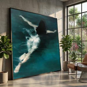 May include: A large rectangular framed wall art piece featuring an oil painting of a figure swimming underwater. The composition uses deep teal and dark blue tones to depict the silhouette of a person submerged in water with light reflecting.