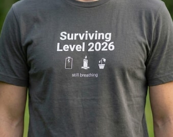 Surviving 2026 Comfort Colors T-Shirt | dark humor