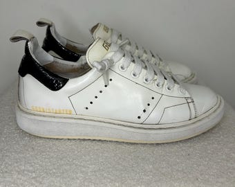 Zapatillas Golden Goose Starter Vintage de piel blanca con detalles en charol negro, talla 36-36.5.