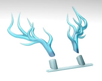 May include: A pair of light blue antlers with a silver base. The antlers are made of a smooth, shiny material and have a delicate, intricate design.