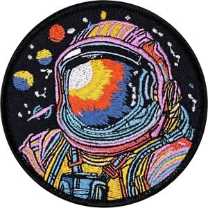 May include: A set of three ceramic mugs with a speckled, cream-colored glaze. Each mug features a different hand-painted floral design in shades of blue, green, and yellow. The mugs have a simple, rounded shape and a comfortable handle.