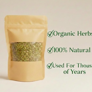 May include: A kraft paper pouch filled with dried green herbs. The text on the right side of the pouch reads "Organic Herbs", "100% Natural", and "Used For Thousand of Years".