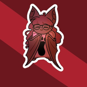 May include: A sticker featuring a cartoon bat character with glasses, wings, and a paw print on its chest. The bat is in shades of red and brown, with a white outline. The background is a diagonal red and maroon pattern.