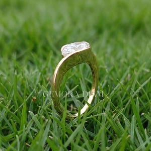Sparkly D color VVS1 moissanite ring in 925 sterling silver, unique marquise bypass design, affordable luxury jewelry.