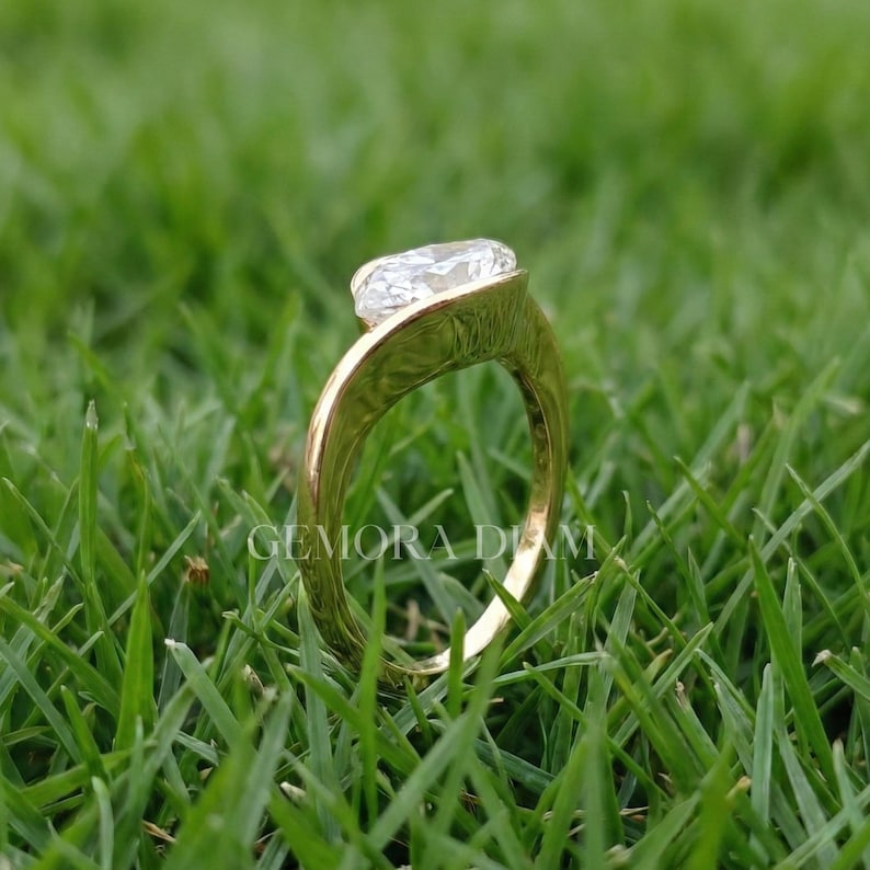 Sparkly D color VVS1 moissanite ring in 925 sterling silver, unique marquise bypass design, affordable luxury jewelry.