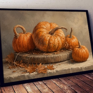 May include: A framed wall art print depicting a still life of four orange pumpkins resting on a circular wooden slice. The pumpkins are surrounded by scattered dried brown maple leaves, set against a neutral, muted beige background.