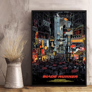 May include: A white ceramic mug with a black handle and the text "But First, Coffee" in a black, handwritten-style font. The mug is on a white surface.