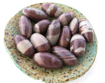 Shiva Lingam Stone: Semi-Polished Oval Gem