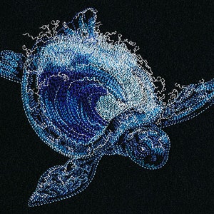 May include: A blue and white embroidered sea turtle design with a wave pattern. The turtle is swimming in a swirling wave.