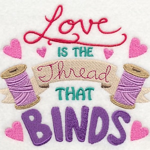 May include: Embroidered design with the text "Love is the thread that binds" in purple, teal, and pink. The design features two spools of thread and hearts.