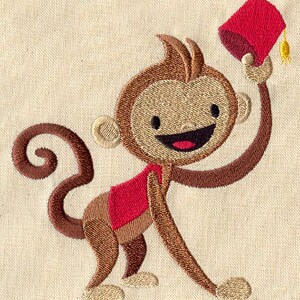 May include: A brown monkey wearing a red vest and a red fez with a gold tassel. The monkey is smiling and holding the fez in its right hand.