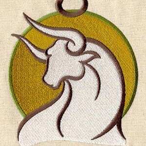 May include: Embroidered Taurus zodiac sign with a white bull head silhouette on a yellow circle with a brown Taurus symbol above.