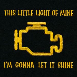 May include: A black background with yellow text that reads "This little light of mine I'm gonna let it shine."  A yellow check engine light symbol is in the center of the image.