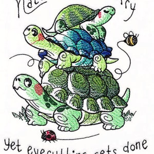 May include: An embroidered design featuring a stack of green turtles with the text "Nature doesn't hurry, yet everything gets done." A bee and ladybug are also included in the design.