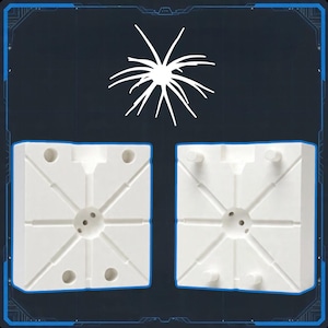 Könnte beinhalten: Zwei weiße, quadratische Formen mit einer zentralen Kugel und radialen Linien, die für die Herstellung bestimmt sind. Eine weiße, stilisierte Sternburst-Grafik befindet sich über den Formen auf einem dunkelblauen Hintergrund mit blauem Rand.