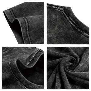 May include: Close-up shots of a dark gray, acid-washed t-shirt. The images highlight the texture and stitching details of the fabric, including the neckline, sleeves, and hem. The fabric appears soft and slightly worn.