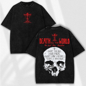 May include: Black t-shirt with red graphic of a cross and text. The back of the shirt features a skull graphic and the words "DEATH TO THE WORLD" and "WHAT YOU ARE I ONCE WAS WHAT I AM YOU WILL SURELY BECOME."