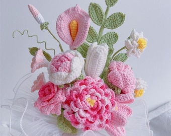 May include: A handmade crochet bouquet featuring various flowers in shades of pink, white, and green. The bouquet includes roses, calla lilies, and other floral designs. The bouquet is held together with a white, ruffled collar. The text "Pattern PDF" is visible.