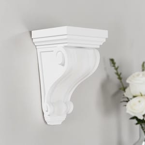May include: A white wall-mounted corbel featuring a flat rectangular top shelf, a curved S-shaped profile, and decorative scroll details at the top and bottom. The architectural bracket has a smooth matte finish and a clean, solid white color.