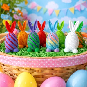May include: A wicker basket filled with colorful Easter egg decorations. The eggs are shaped like bunnies, with various colors and patterns, including stripes and swirls. The background features a blue sky with clouds and decorative flags.