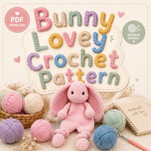 May include: A digital PDF download for a Bunny Lovey Crochet Pattern featuring a pink crocheted bunny toy, various colorful yarn balls, a crochet hook, and a notebook. The text reads Bunny Lovey Crochet Pattern, PDF Download, and Beginner Friendly.