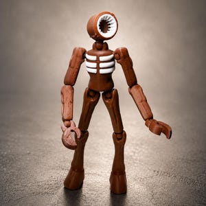 May include: A brown Siren Head action figure with a cylindrical head and a white, toothed opening. The figure has articulated limbs and a skeletal chest design. The figure is standing on a textured surface.