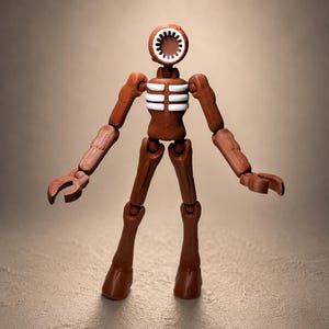 May include: A brown articulated figure with a siren-shaped head and white accents on the chest. The figure has jointed arms and legs, and claw-like hands. The toy is posed against a neutral background.