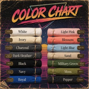 May include: A color chart featuring two columns of folded fabric rolls in various shades including white, ivory, charcoal, dark heather, black, navy, royal, light pink, blossom, light blue, sand, military green, moss, and pepper with labels.