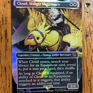 May include: A holographic trading card featuring Cloud, Midgar Mercenary, riding a yellow bird. The card has text describing the character's abilities. The card is a collectible item from the Final Fantasy VII series.