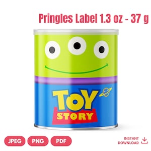 May include: A Pringles can featuring a green alien face design with three eyes, a purple band, and a blue base with the "Toy Story" logo. The label reads "Pringles Label 1.3 oz - 37 g".