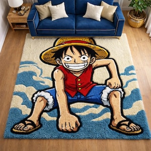 Könnte beinhalten: Ein rechteckiger Teppich mit einer Cartoonfigur in roter Weste, blauen Shorts und einem Strohhut. Der Teppich hat einen blau-beige Hintergrund mit einem Wellenmuster. Die Figur befindet sich in einer dynamischen Pose mit einem breiten Grinsen.