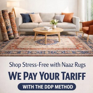 May include: An interior scene featuring a beige sofa with colorful throw pillows, a round wooden coffee table, and a patterned rug. Rolled rugs stand to the left. The text "Naaz Rugs" is at the top.