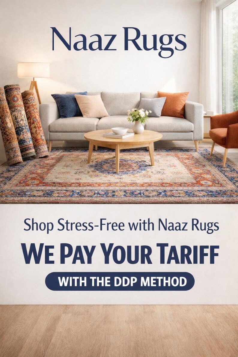 May include: An interior scene featuring a beige sofa with colorful throw pillows, a round wooden coffee table, and a patterned rug. Rolled rugs stand to the left. The text "Naaz Rugs" is at the top.