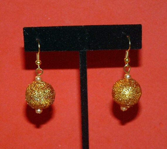 Items similar to Gold Ball Glitter Earrings on Etsy
