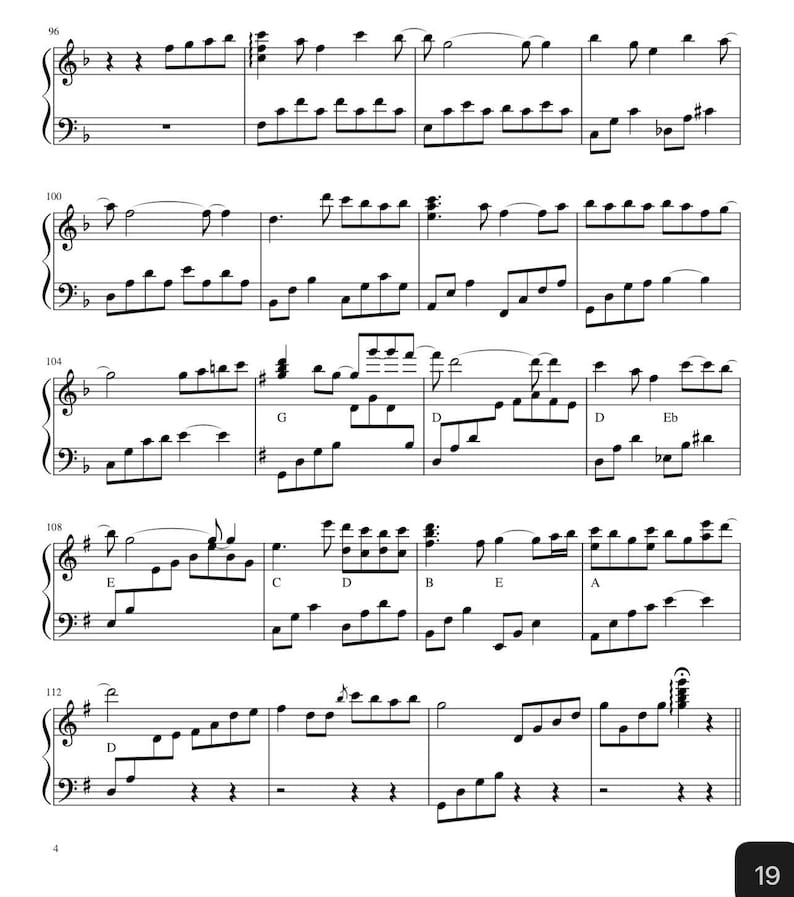 May include: A sheet of musical notation with treble and bass clefs. The notes are black on a white background, with various musical symbols and letters indicating key signatures and dynamics. The score is for piano.