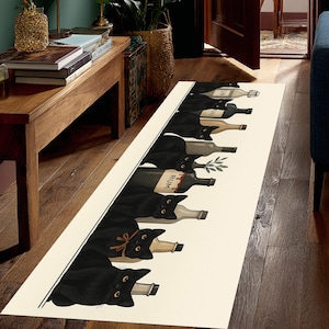May include: A rectangular cream-colored rug featuring a whimsical design of black cats and wine bottles. The cats are positioned as if they are the bottles' corks. The bottles have labels like "Gin" and "Rum".