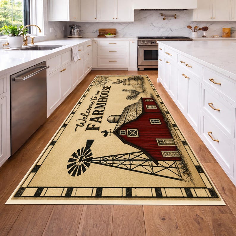 May include: A rectangular floor runner rug featuring a cream-colored background with a black border. The design includes a red barn, a black windmill, and a rooster illustration. The text Welcome to our FARMHOUSE is printed in black script.