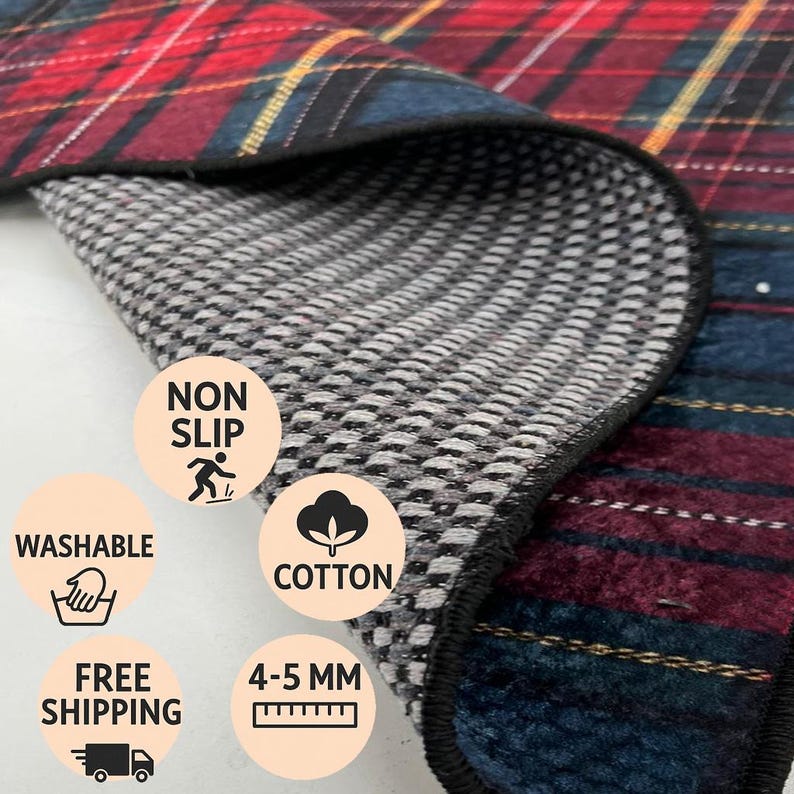May include: A plaid blanket with red, blue, and yellow accents. The underside is a gray and white non-slip material. Features include washable cotton, and a thickness of 4-5 mm.
