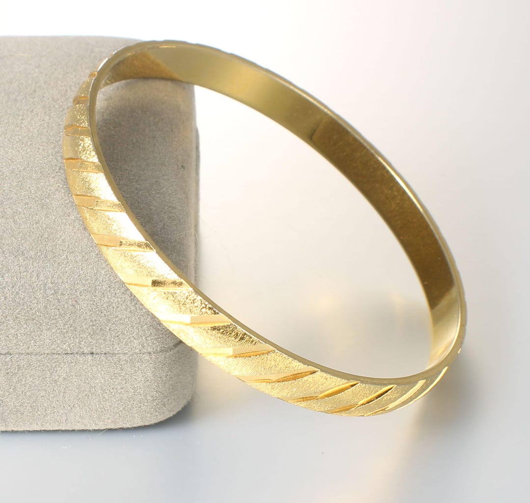 VINTAGE 80'S GOLD TONE DIAGONAL STRIPED MONET BANGLE
