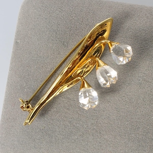 Swarovski crystal Lily of the Valley Brooch, gold tone, swan logo