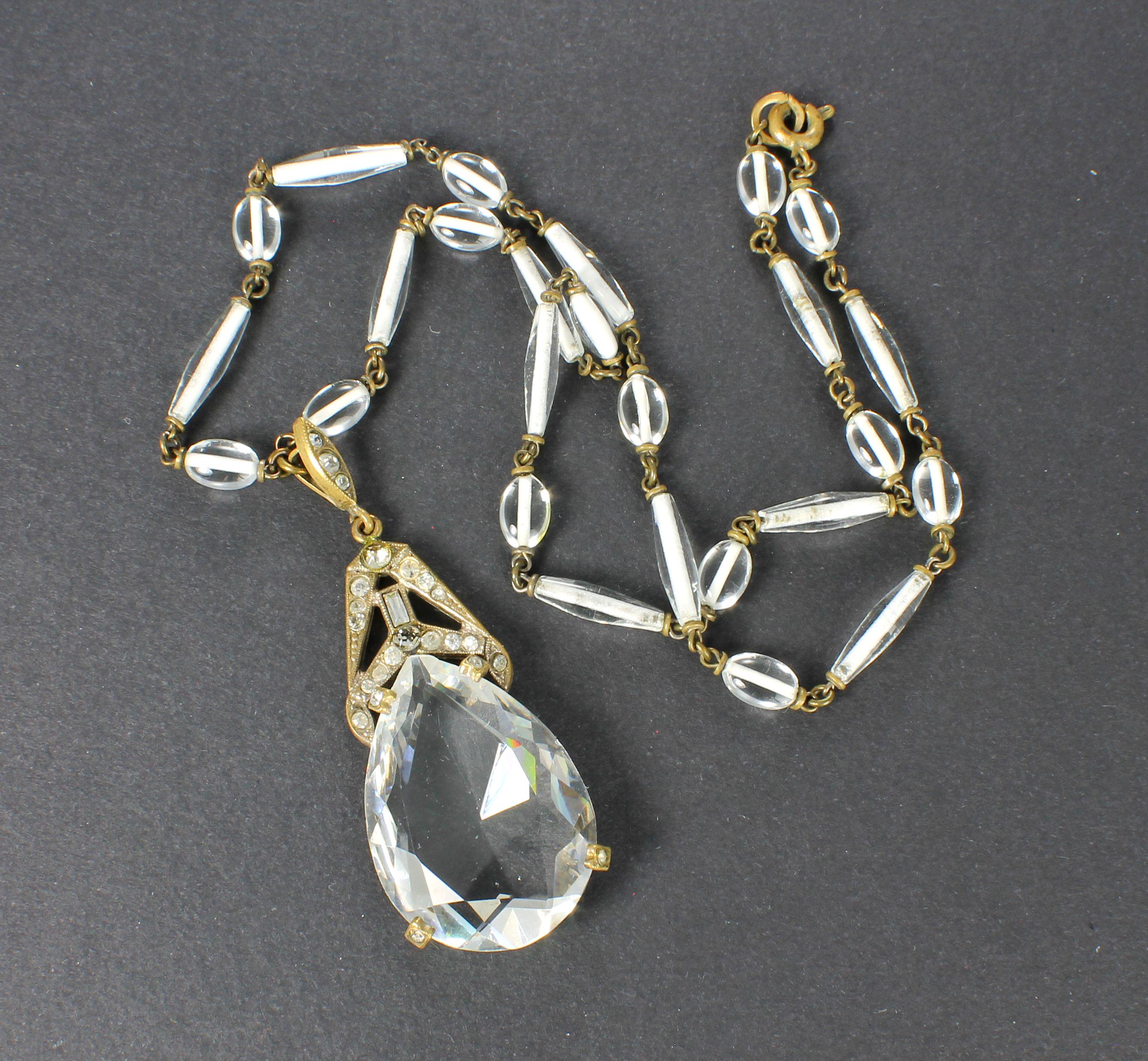 Guy Laroche France streamline shape × white glass parts